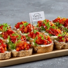 Bruschetta with honey-feta cream and grilled peppers (20 pcs/plate)